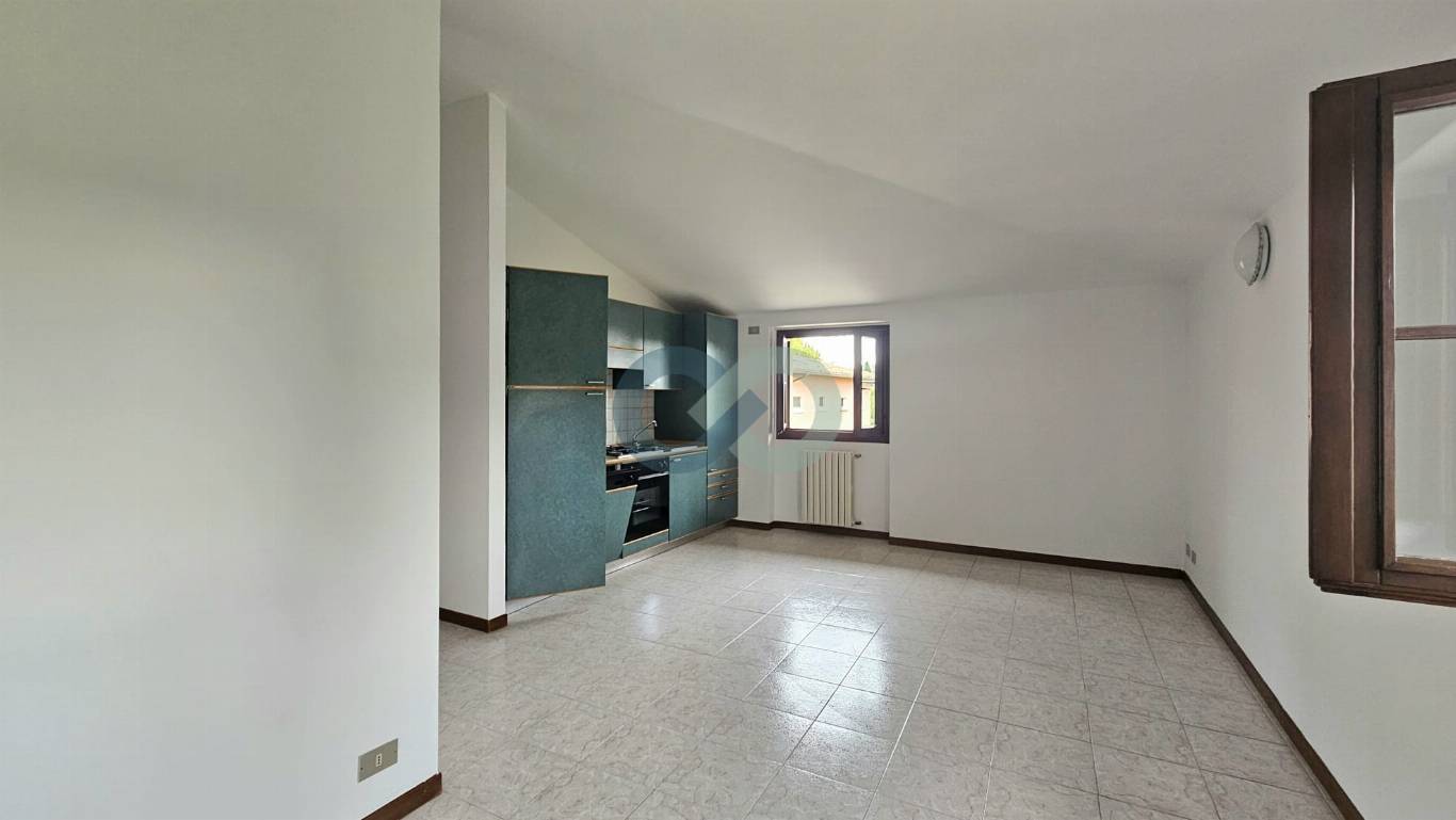 TRILOCALE MANSARDATO 9
