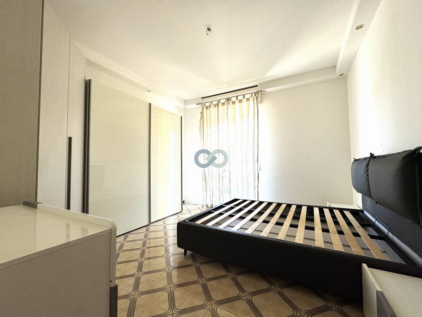 GRANDE APPARTAMENTO CON CANTINA E BOX AUTO 13