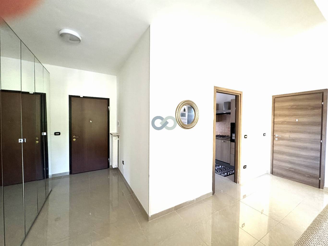 GRANDE APPARTAMENTO CON CANTINA E BOX AUTO 2