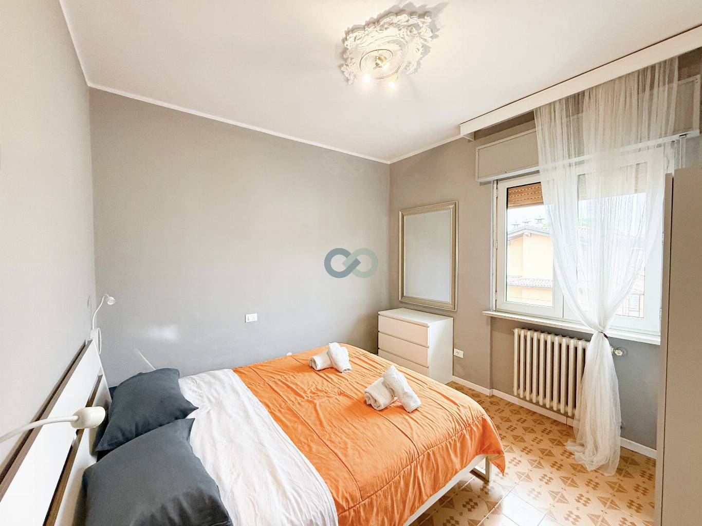 APPARTAMENTO TRILOCALE CON TAVERNA E GIARDINO 31