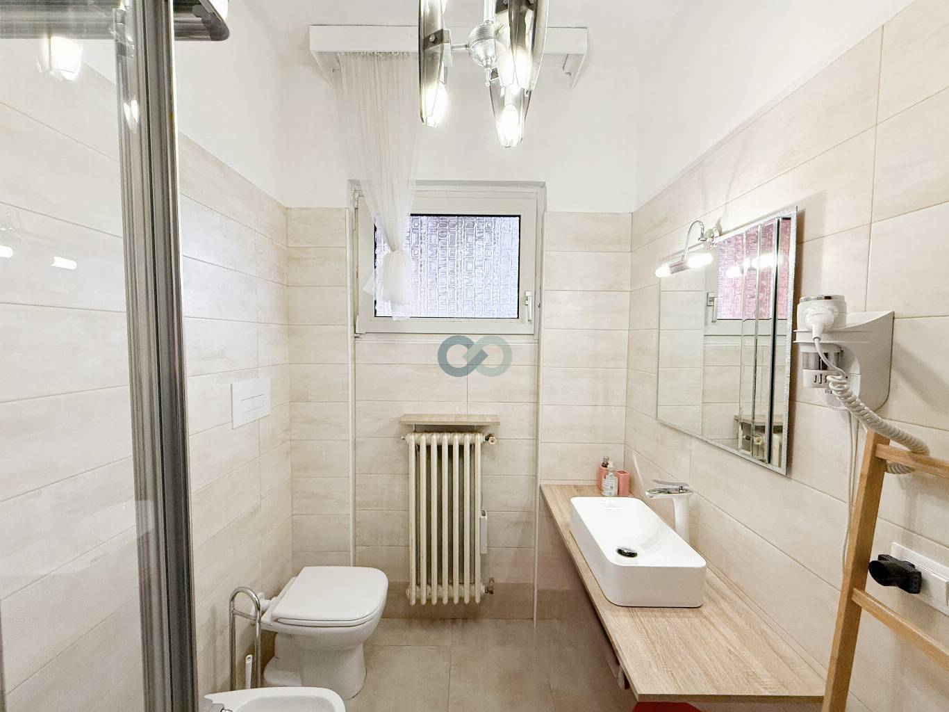 APPARTAMENTO TRILOCALE CON TAVERNA E GIARDINO 34