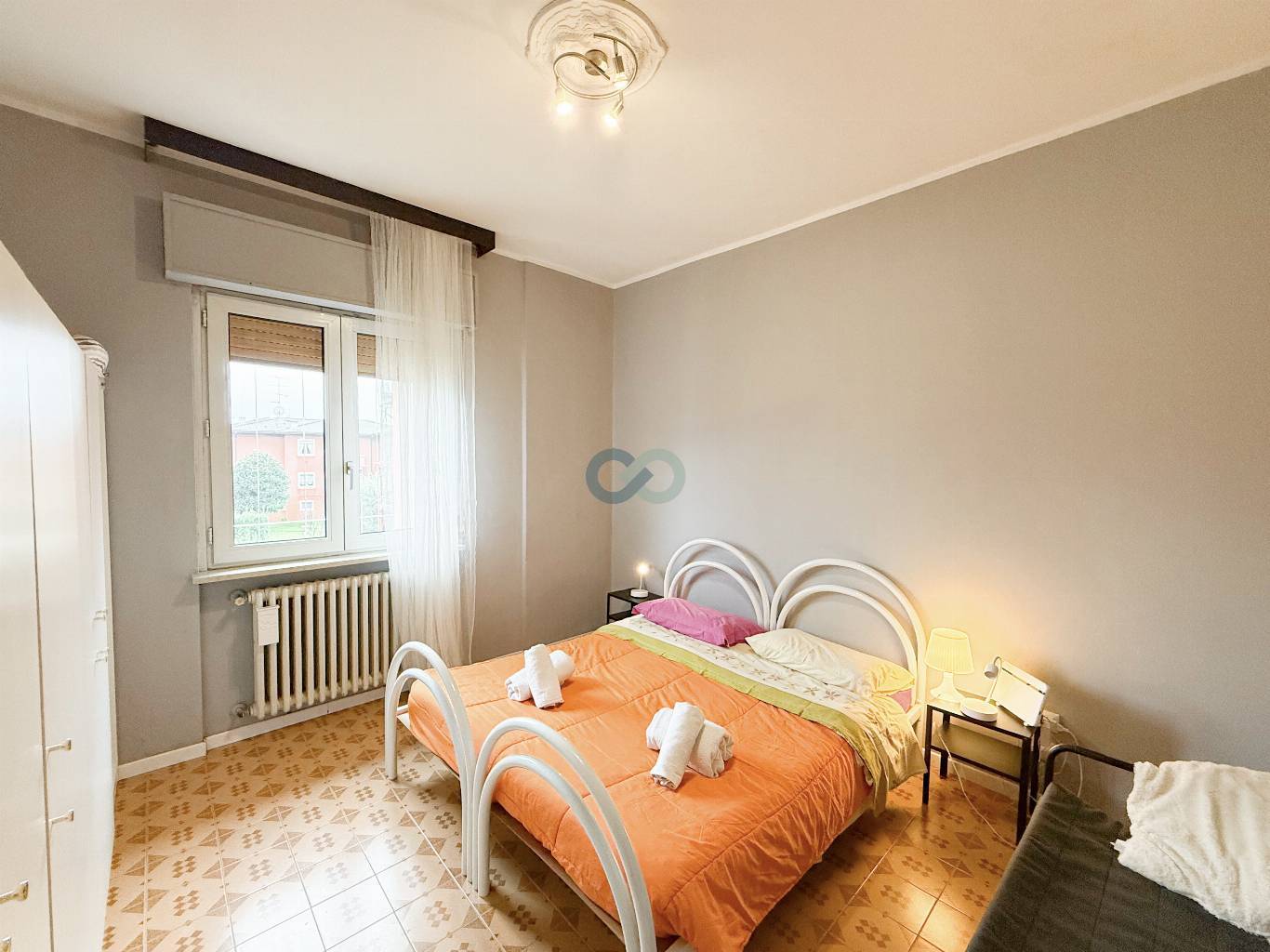 APPARTAMENTO TRILOCALE CON TAVERNA E GIARDINO 38