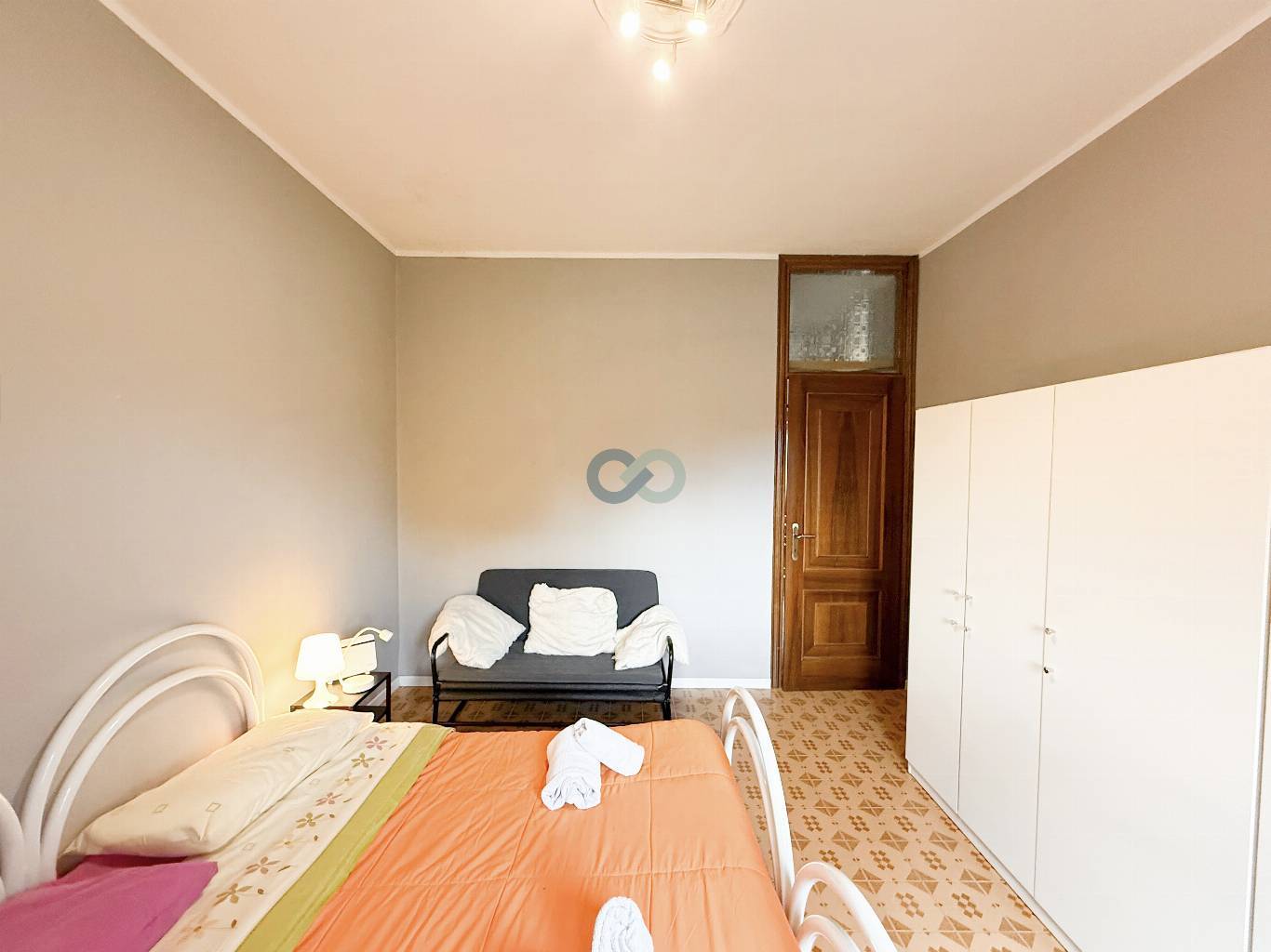 APPARTAMENTO TRILOCALE CON TAVERNA E GIARDINO 42