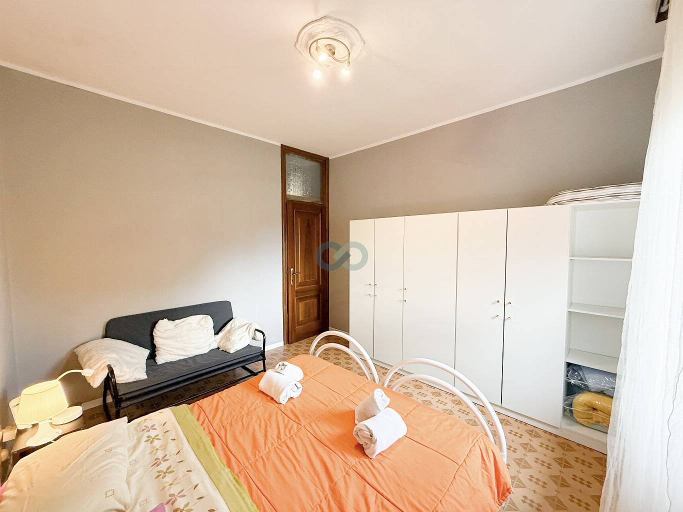 APPARTAMENTO TRILOCALE CON TAVERNA E GIARDINO 43