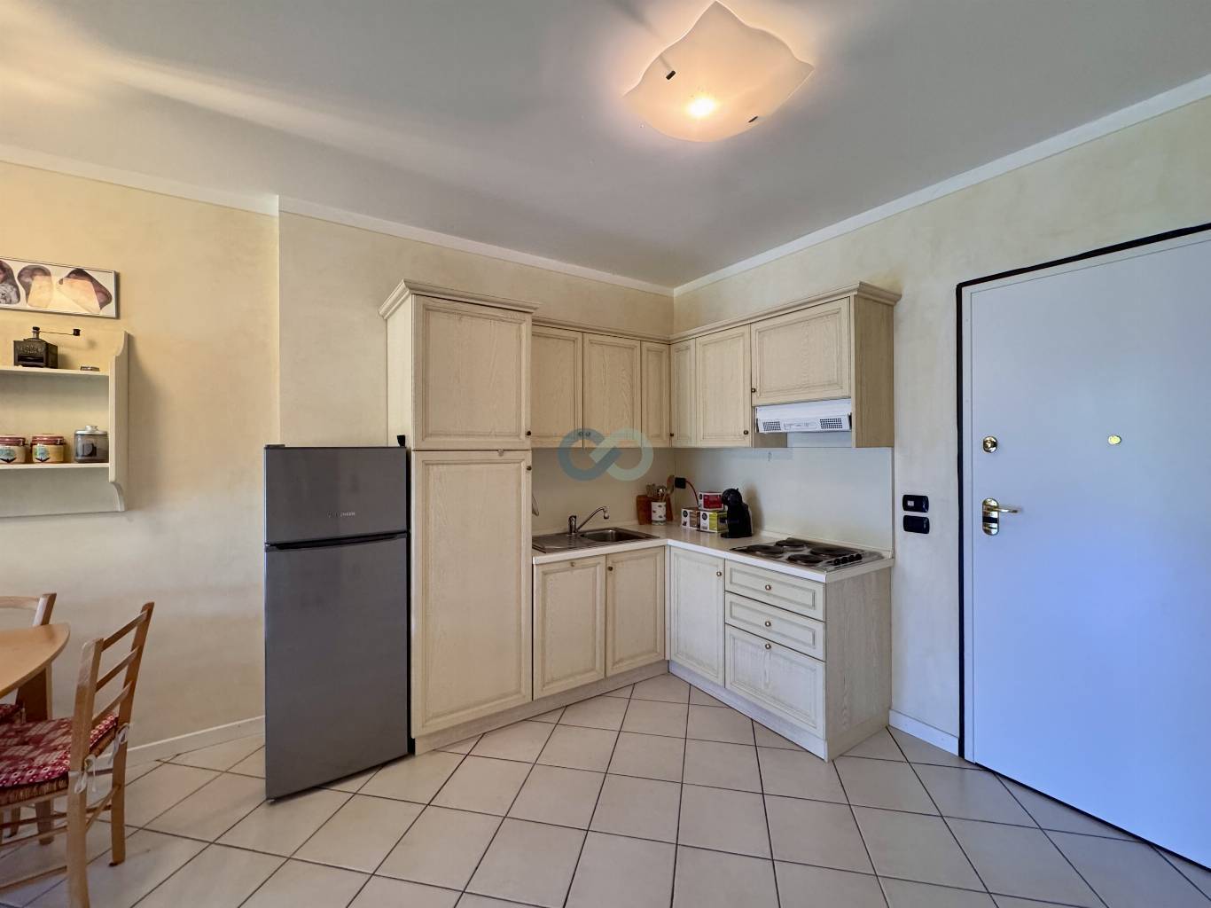 BILOCALE CON GIARDINO IN RESIDENCE CON PISCINA 15