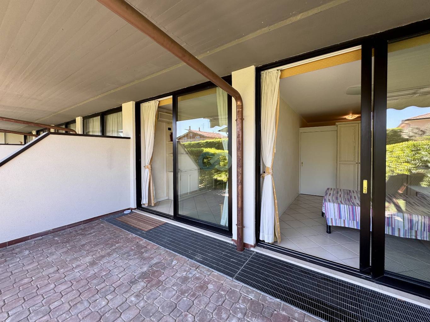 BILOCALE CON GIARDINO IN RESIDENCE CON PISCINA 23