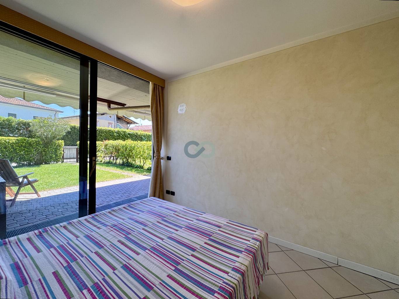 BILOCALE CON GIARDINO IN RESIDENCE CON PISCINA 24