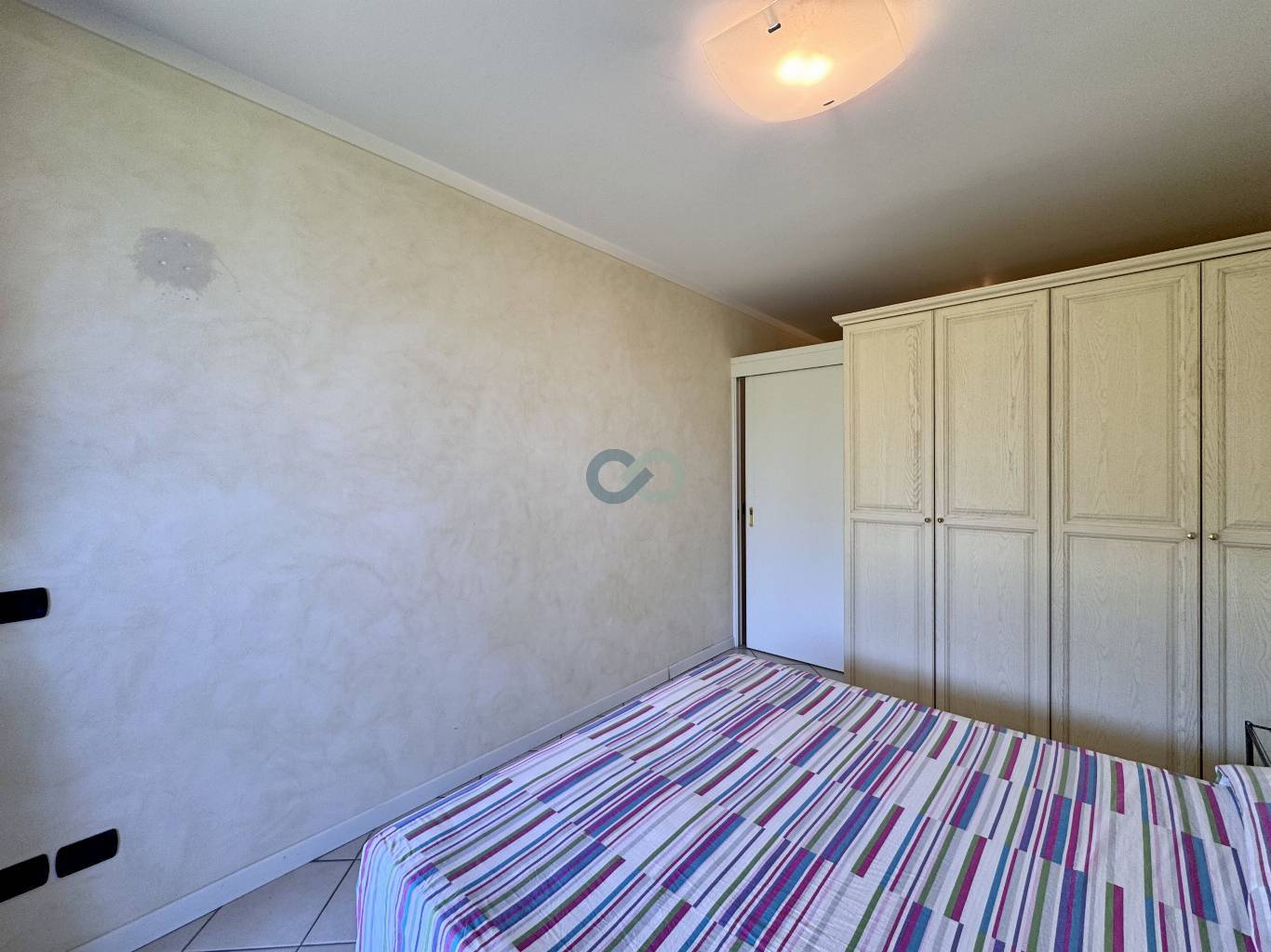 BILOCALE CON GIARDINO IN RESIDENCE CON PISCINA 26