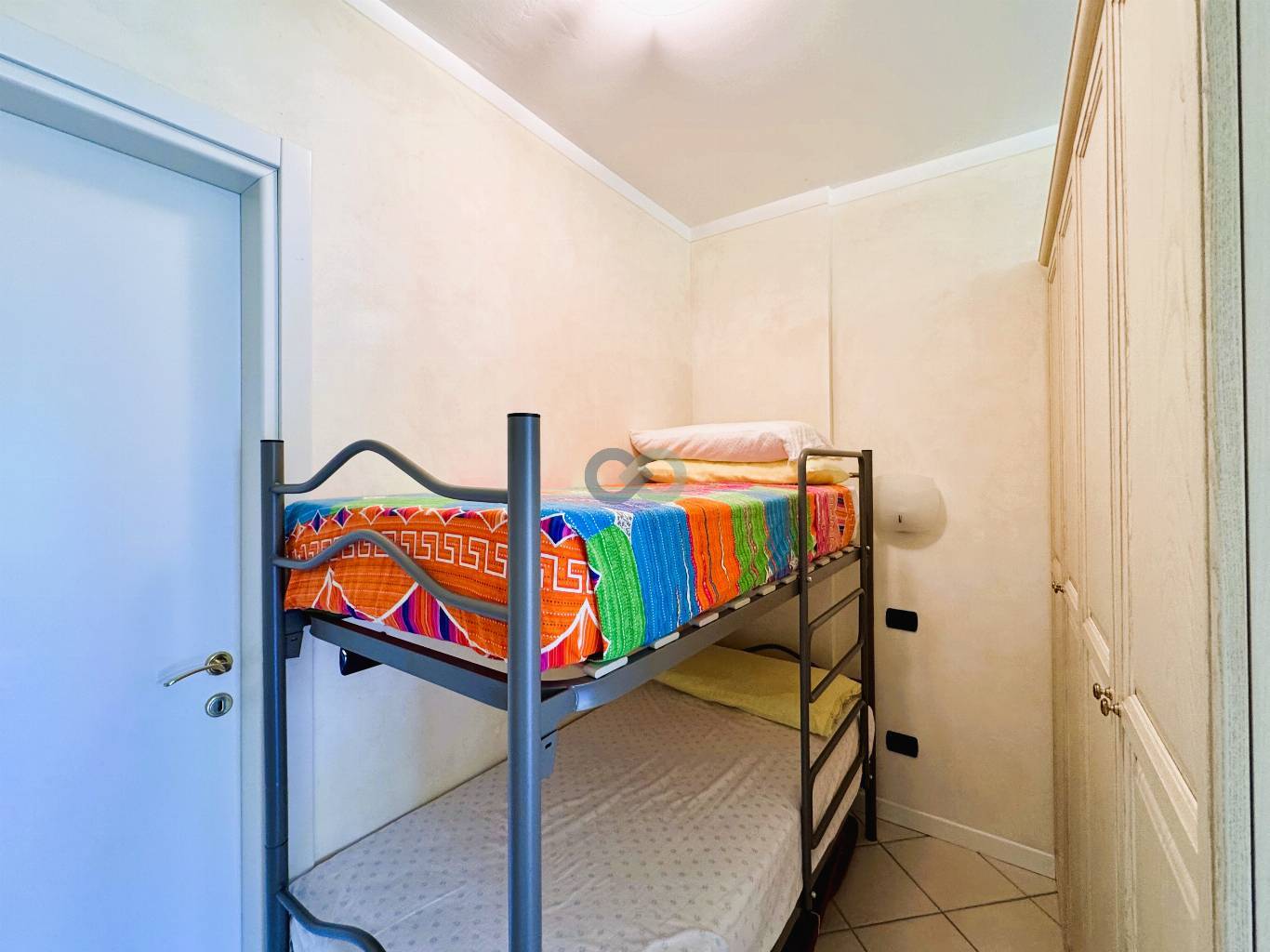 BILOCALE CON GIARDINO IN RESIDENCE CON PISCINA 28