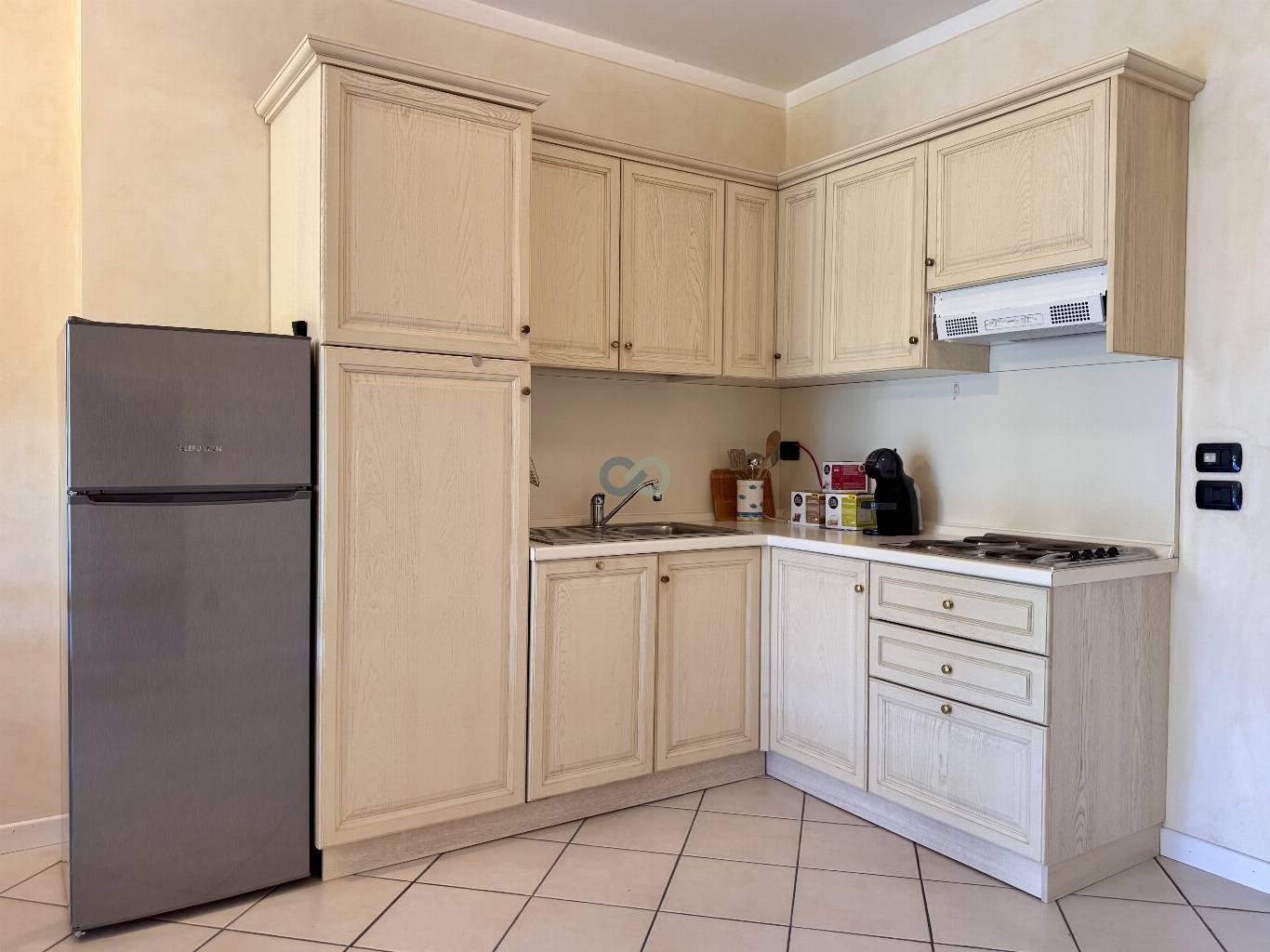 BILOCALE CON GIARDINO IN RESIDENCE CON PISCINA 33