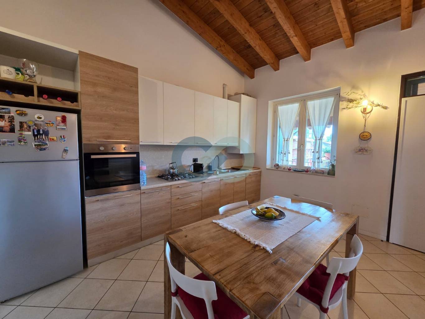 Trilocale con loggia e box doppio 24