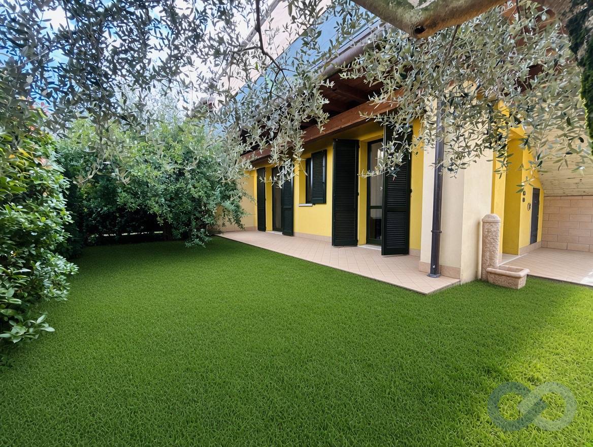 Bilocale con giardino 1